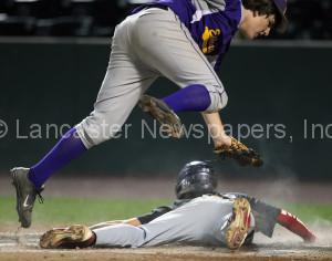 Ephrata pitcher Dillon Good tags out Hempfield Black's Ty Jackson after a wild pitch. (Chris Knight photo)