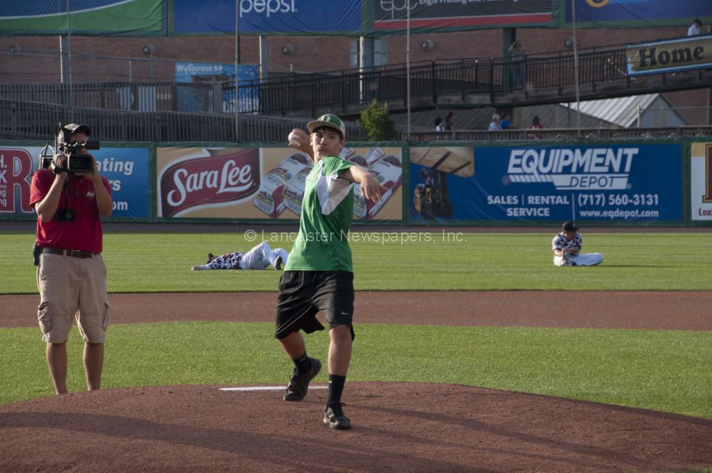 Donegal's Richard Velez throws a first pitch at Monday night's Barnstormer's game. (Brian Leid photo)