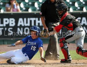 Hempfield Black catcher Nick Boulanger (21) tags out Strasburg Willow Street's Todd Shelley (15) at the plate during 3rd inning action of an LNP Tournament quarterfinal game at Clipper Magazine Stadium in Lancaster Wednesday July 22, 2015.(Photo/Chris Knight)