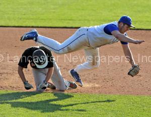 Hempfield Black's Matt Brooks (27) is out after Cocalico third baseman Austin Harven (20) catches him in a run down during 6th inning action of an LNP Tournament Midget Semifinal game at Clipper Magazine Stadium in Lancaster Friday July 24, 2015.(Photo/Chris Knight)