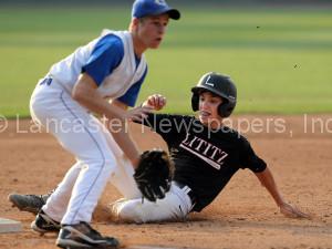 Lititz Oddfellows Jake Weachter (10) steals third base as Cocalico's Jerrell Martin (5) waits for the throw during 3rd inning action of an LNP Tournament Midget Championship game at Clipper Magazine Stadium in Lancaster Sunday July 26, 2015.(Photo/Chris Knight)