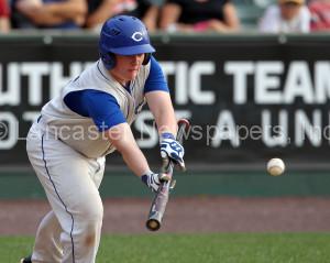 Cocalico's Kyle Robb (25) lays down a bunt against Lititz Oddfellows during 4th inning action of an LNP Tournament Midget Championship game at Clipper Magazine Stadium in Lancaster Sunday July 26, 2015.(Photo/Chris Knight)