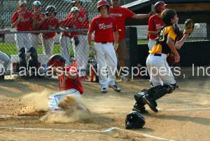 Safe at home plate, Warwick scores early against Mountville Tuesday night. (Robert R. Devonshire Jr. photo)